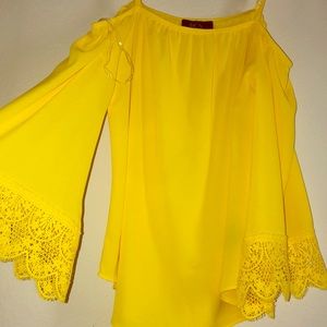 A cute Off the shoulder yellow top with straps